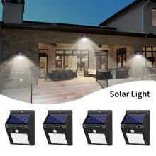Load image into Gallery viewer, IP45 Waterproof Solar Outdoor Lights - Set of 4 motion sensor security lights with 3 lighting modes for garden fences, garages.
