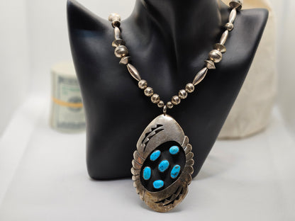 Zuni Tribe Native American Sterling Silver Jewelry with Large Pendant with Turquoise Inlay