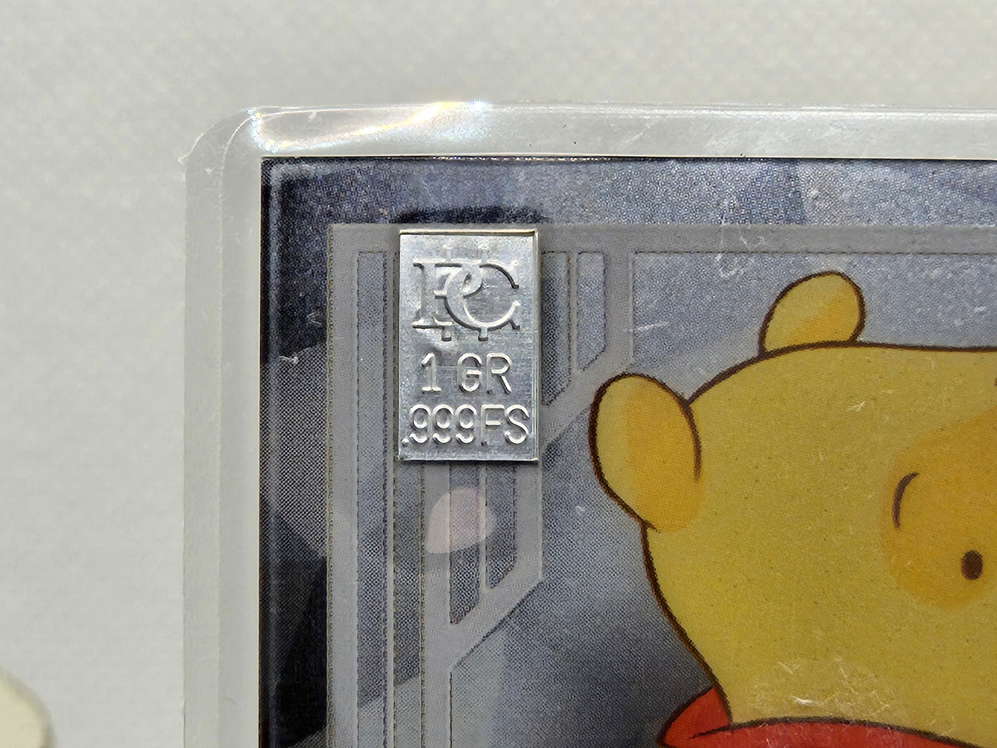 1 Grain Pure Silver Bar in Premium Disney 1 Grain Pure Premium Silver Bar in Card Assay .999 Winnie the P Collectable Card .999 Asha Collectable Card
