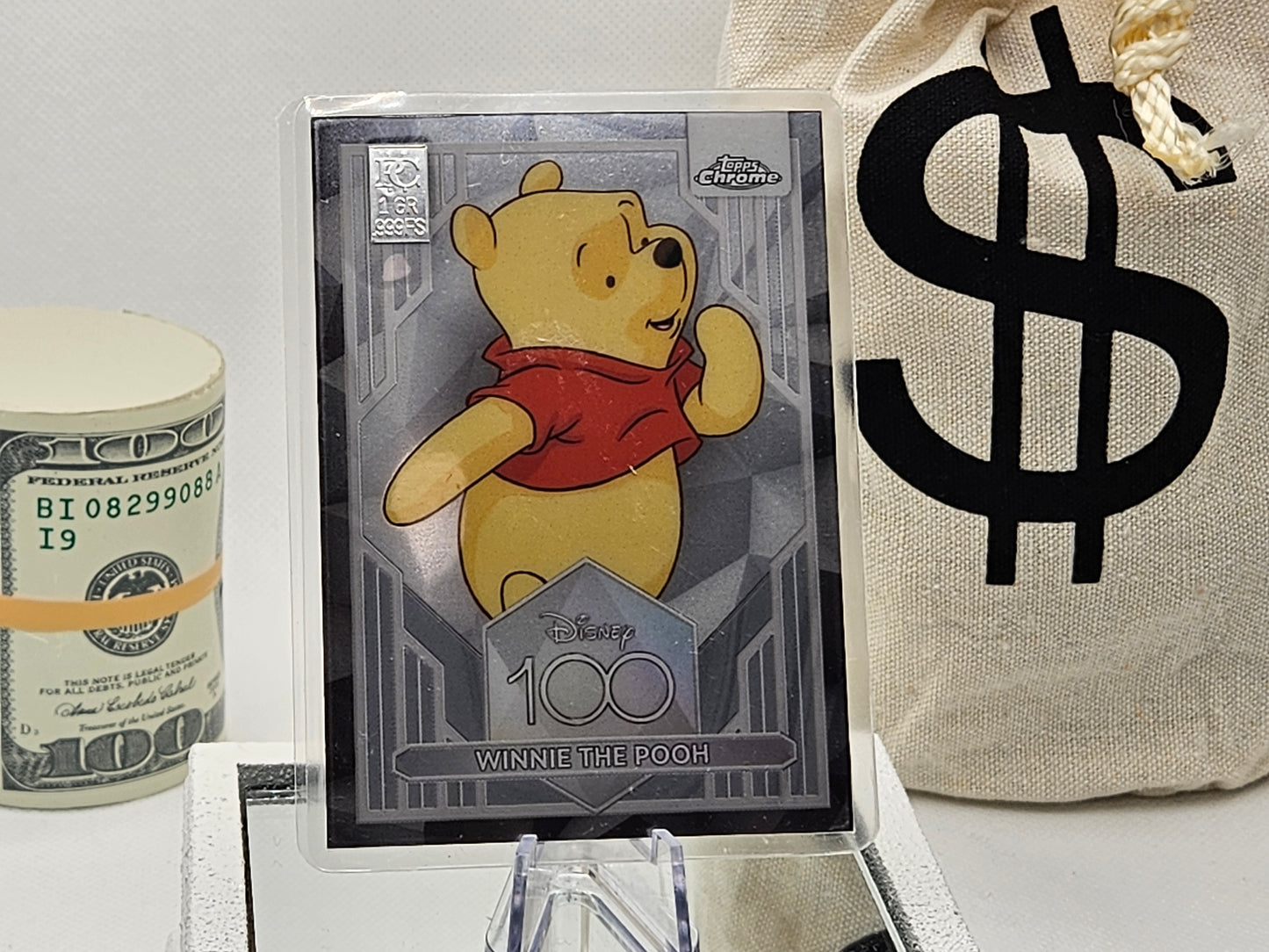 1 Grain Pure Silver Bar in Premium Disney 1 Grain Pure Premium Silver Bar in Card Assay .999 Winnie the P Collectable Card .999 Asha Collectable Card