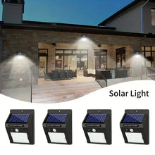 Load image into Gallery viewer, IP45 Waterproof Solar Outdoor Lights - Set of 4 motion sensor security lights with 3 lighting modes for garden fences, garages.

