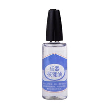 Load image into Gallery viewer, Musical Instrument Keys Oil 30ml Sturdy Reusable Saxophone Clarinet Maintenance Oil for Clarinet Sax Cornet Oboe Piccolo Trumpet
