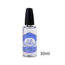 Load image into Gallery viewer, Musical Instrument Keys Oil 30ml Sturdy Reusable Saxophone Clarinet Maintenance Oil for Clarinet Sax Cornet Oboe Piccolo Trumpet
