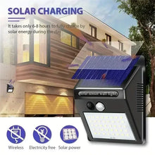 Load image into Gallery viewer, IP45 Waterproof Solar Outdoor Lights - Set of 4 motion sensor security lights with 3 lighting modes for garden fences, garages.
