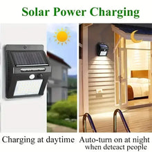 Load image into Gallery viewer, IP45 Waterproof Solar Outdoor Lights - Set of 4 motion sensor security lights with 3 lighting modes for garden fences, garages.
